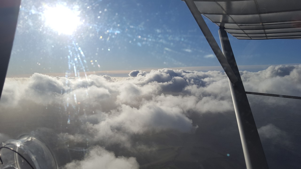 View above the clouds from a C52 fixed-wing microlight